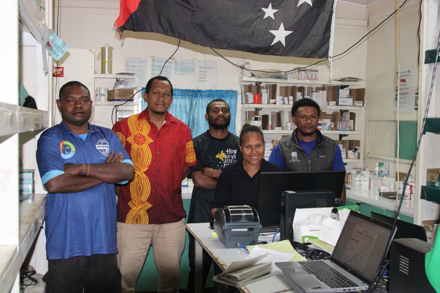 Pharmacy and dispensary staff on duty, keeping essential medicines available.